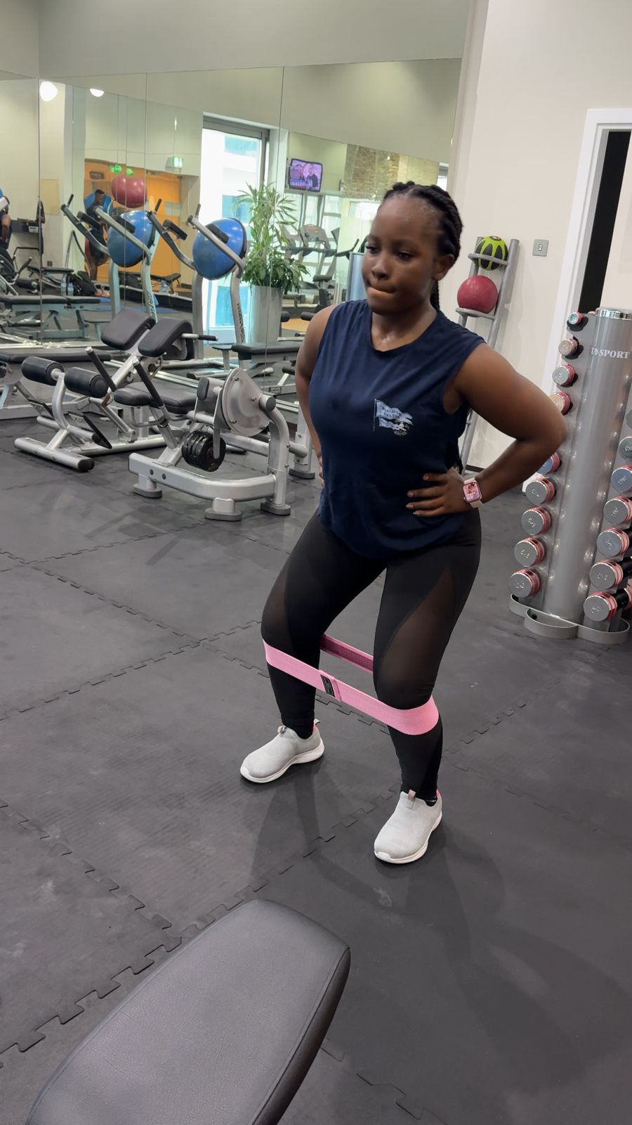 Banded squat for hip stability during personal training